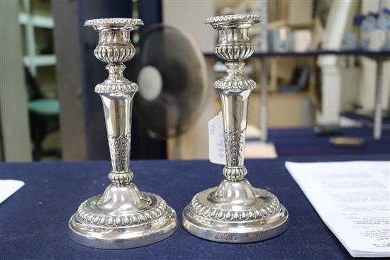 A pair of George III silver candlesticks, by Matthew Boulton, Birmingham 1808, loaded bases, h. 19.5cm